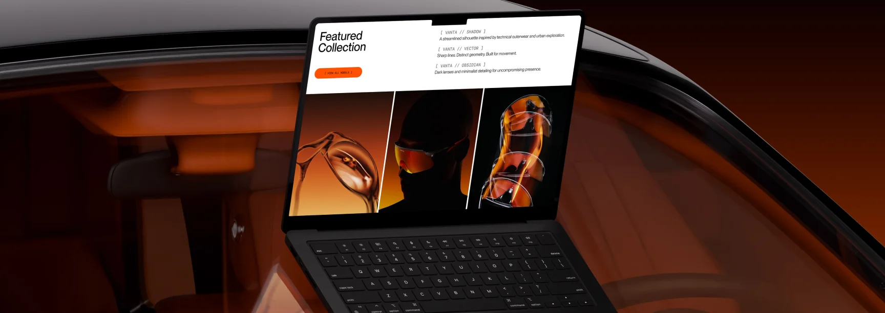 Laptop on a car dashboard displaying the VANTA eyewear collection page